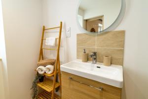 Appartements OIQIA • Arieja : photos des chambres