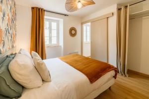 Appartements OIQIA • Arieja : photos des chambres