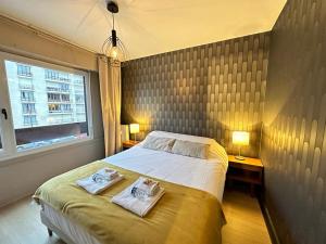 Appartements Flechambault face a la Basilique avec terrasse : photos des chambres