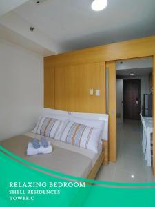 GV Holiday Homes - Shell Residences MOA - Cozy 1BR Apartment