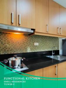 GV Holiday Homes - Shell Residences MOA - Cozy 1BR Apartment