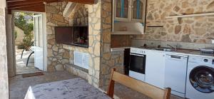 Kuća Domina Dučac, Postira