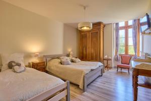 Maisons de vacances CAPE - maison avec piscine et jacuzzi : photos des chambres