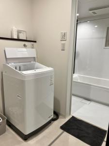 新築"Kaara"駅から2分 USJ空庭難波梅田まで10分!!まるごと一軒家貸し切り!!大人数宿泊可能!駐車場有