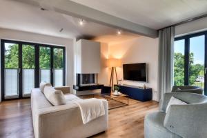 Ferienwohnung Sonnenloft 14 mit eigenem Kamin und Sauna im Haus Düne 7 Prora