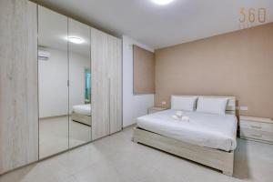 Rooftop Pool Sensations Apartmentswith WIFI and AC by 360 Estates