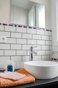 Appartements Studio lumineux au coeur d-Aix-les-Bains : photos des chambres