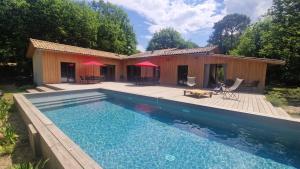 Maisons de vacances Le Bois de la Hutte - Piscine privee : photos des chambres