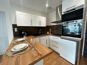 Appartements La Suite Chataigner, chic et calme : photos des chambres