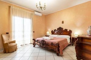 GuestHost - Center Apartment Catania