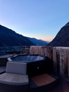 Lodges La tour du Chateau - Jacuzzi sur le toit : photos des chambres