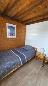 Chalets Au bord du lac : photos des chambres
