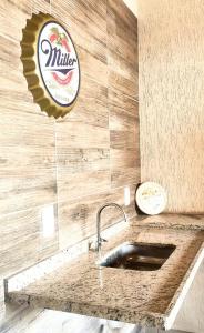 Central Praias Suíte 103 com TV, frigobar, banheiro privativo