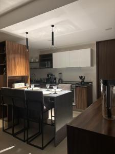 Departamento residencial con alberca y gym