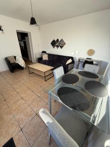 Appartements Maison T3 avec jardin : photos des chambres
