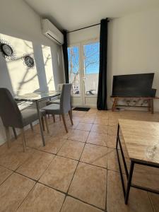 Appartements Maison T3 avec jardin : Appartement 2 Chambres