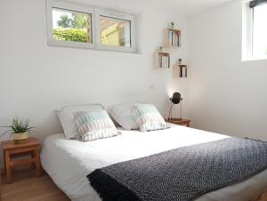 Appartements L-Olivier, appartement cosy entre mer et foret : photos des chambres