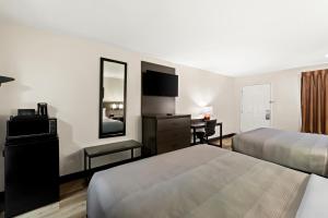 Quadruple Room room in Days Inn by Wyndham Dumas