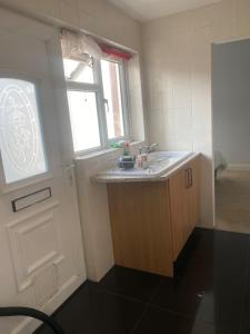 1 double bed house and sofa bed with a garden