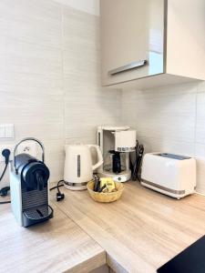 Appartements Elegant T2 - Les pieds dans l-eau : photos des chambres