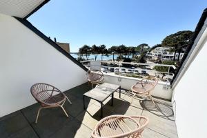 Appartements T2 contemporain - Balcon - Vue mer panoramique : photos des chambres