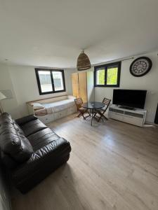 Appartements Charmant studio : photos des chambres
