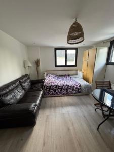 Appartements Charmant studio : photos des chambres