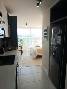 HOM l Parking Faro Mar Costanera Piscina Turistico