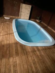 Casa espaçosa, toda climatizada, com piscina, área gourmet, playground