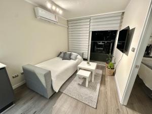 Depto nuevo y acogedor, terraza y estacionamiento