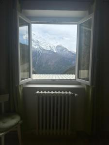 B&B / Chambres d'hotes le Belvedere Maison d hotes : Chambre Quadruple - Vue sur Montagnes
