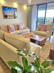 newly furnished two bedroom apartment with swimming pool, fully equipped gym, private parking space ,children playground and unbeatable scenic city views