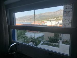 Γκαρσονιέρα δίπλα στην θάλασσα κ θέα στο λιμανι - Ubytování bez kategorie ve městě Évdhilos