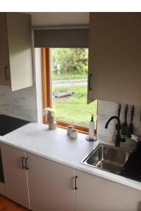 Seaview and Sunsets, Entire place, private entrance, Large Bedroom, Full kitchen and bathroom