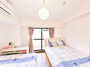 Lucky sky周围设施配套齐全1Ldk可容纳5人 徒步心斋桥商圈 高楼层俯瞰大阪