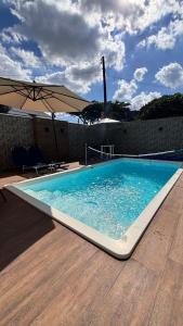 Casa com piscina Balneário Camboriú CasaAlbertiBc