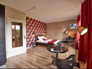 Appart'hotels L'aparthoteL LhL : photos des chambres