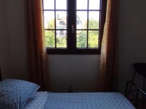 Sejours chez l'habitant Chambre 2 en Pavillon BONNEUIL SUR MARNE : photos des chambres