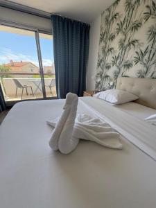 Hotel Sable Et Soleil - Port, Plage & Jacuzzi privé