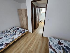 Baltichouse Podczele- 8 os domki blisko morza !!! sauna, jacuzzi,grill, ognisko, plac zabaw