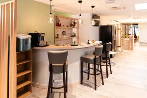 Hotels Hotel Cheval De Bronze : photos des chambres