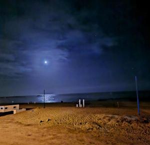 Maison de plage pied dans leau