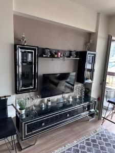 apartment tow bed room and living room with pool and gym