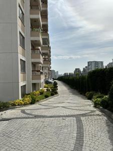 apartment tow bed room and living room with pool and gym