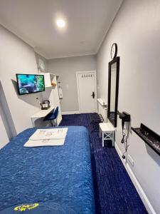 Double Room with Shared Shower and Toilet room in Jubilee Hotel