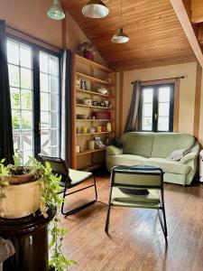 Maisons de vacances Le chalet bucolique au bord de l'eau : photos des chambres