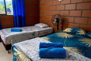 Habitación para 3 con acceso al rio y baño privado en San Rafael Antioquia