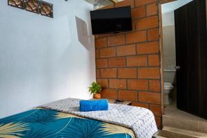 Habitación para 3 con acceso al rio y baño privado en San Rafael Antioquia