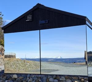 Spegill Escape to Mirror Glass and Breathtaking Calm at 1000m