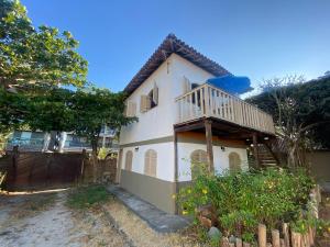 Kitnet em casa à beira-mar